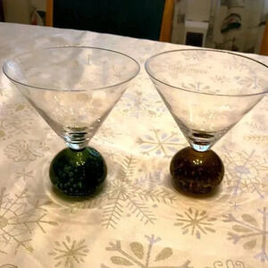 Vintage pair of martini glass green and amber bubble ball glasses.